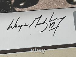 Gretzky & Howe Autographed Slashing Photo / WGA (Gretzky) Authenticated 74/299