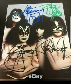 KISS photo Autographed Signed by all 4 Absolutely Authentic