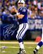 Peyton Manning Indianapolis Colts Autographed 8 X 10 Blue Throwing Photograph