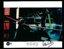 Alec Mills a signé une photo 8x10 authentifiée par BAS du réalisateur principal de ROTJ